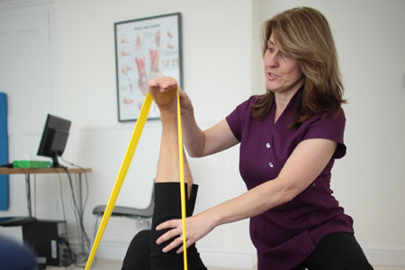 Physiotherapy exercises with client in Chester