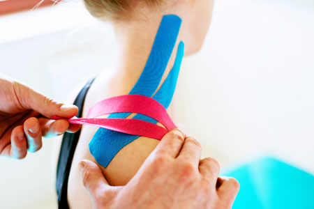 Sports therapist working with client in Wrexham