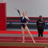 Daisy performing on the mat